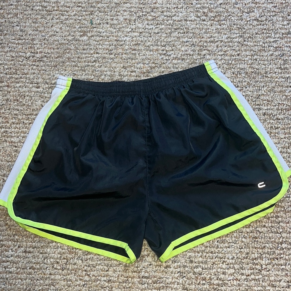 woman’s medium athletic shorts with adjustable waistband in built-in underwear